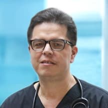 Dr. Gustavo Higuero